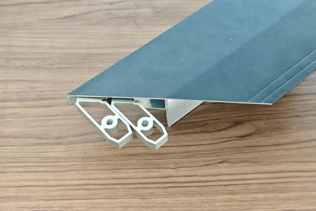 Aluminum window casing 45 degree miter corner with corner bracket and screws